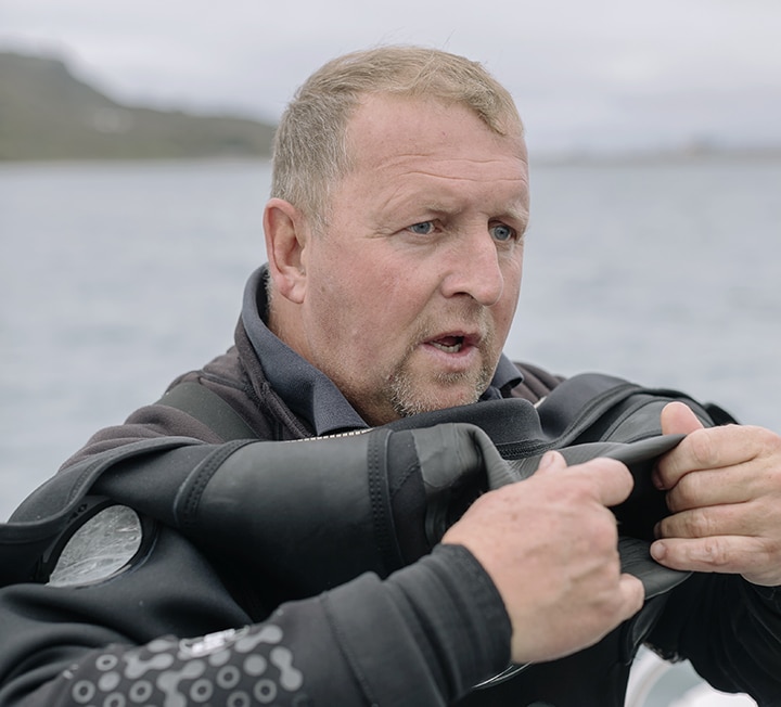 Darren Brown of Shellseekers diving for scallops
