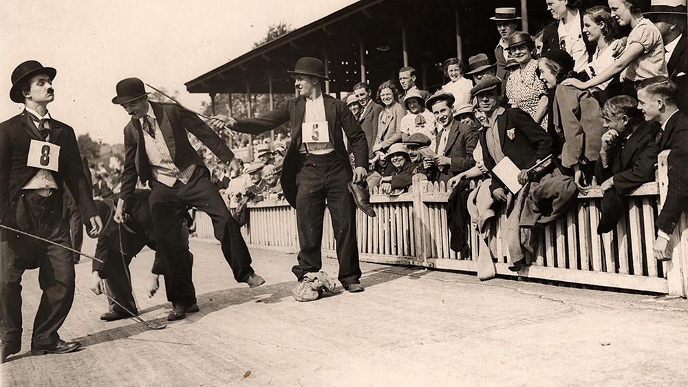 Competitors in the Charlie Chaplin lookalike competition at the Borough Market sports day