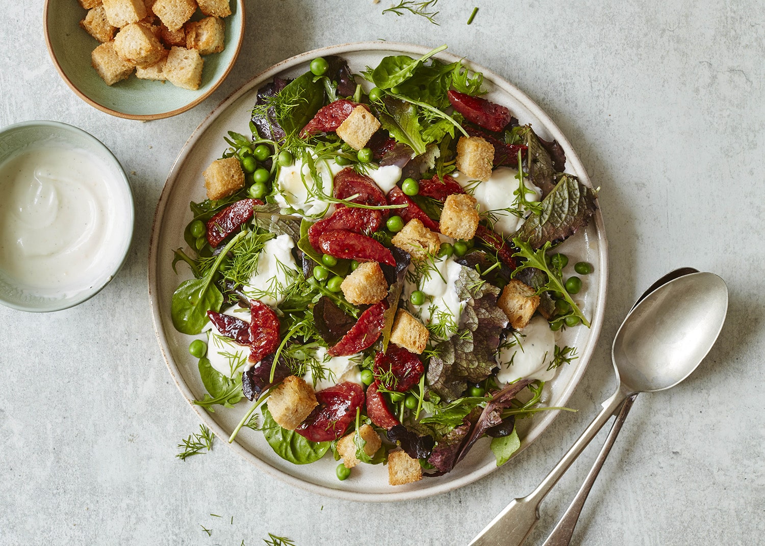Pea, whipped goat’s cheese & honeyed saucisson salad