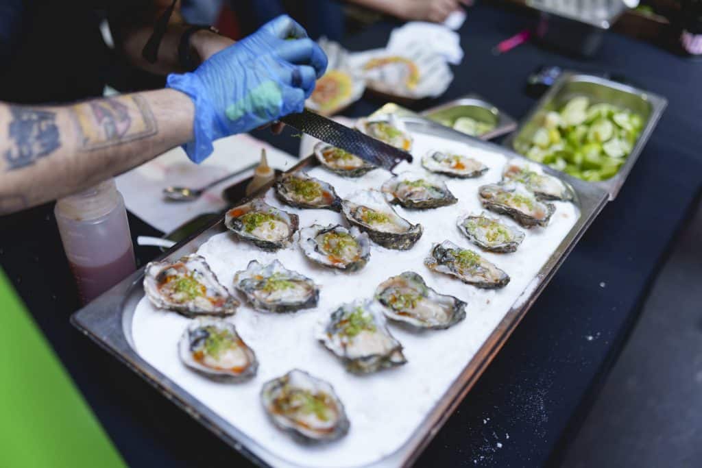 Oysters being dressed at the Evening of Seafood