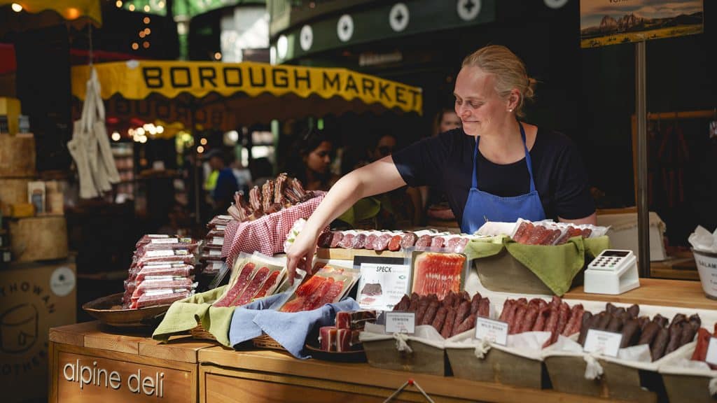 A trader at Borough's Alpine Deli