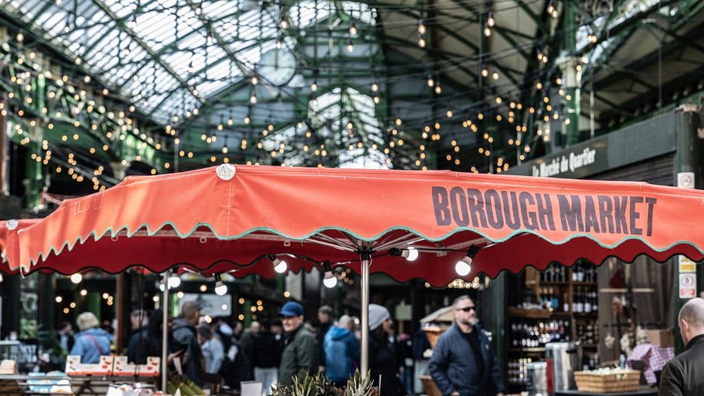 A trader's umbrella with Borough Market branding 